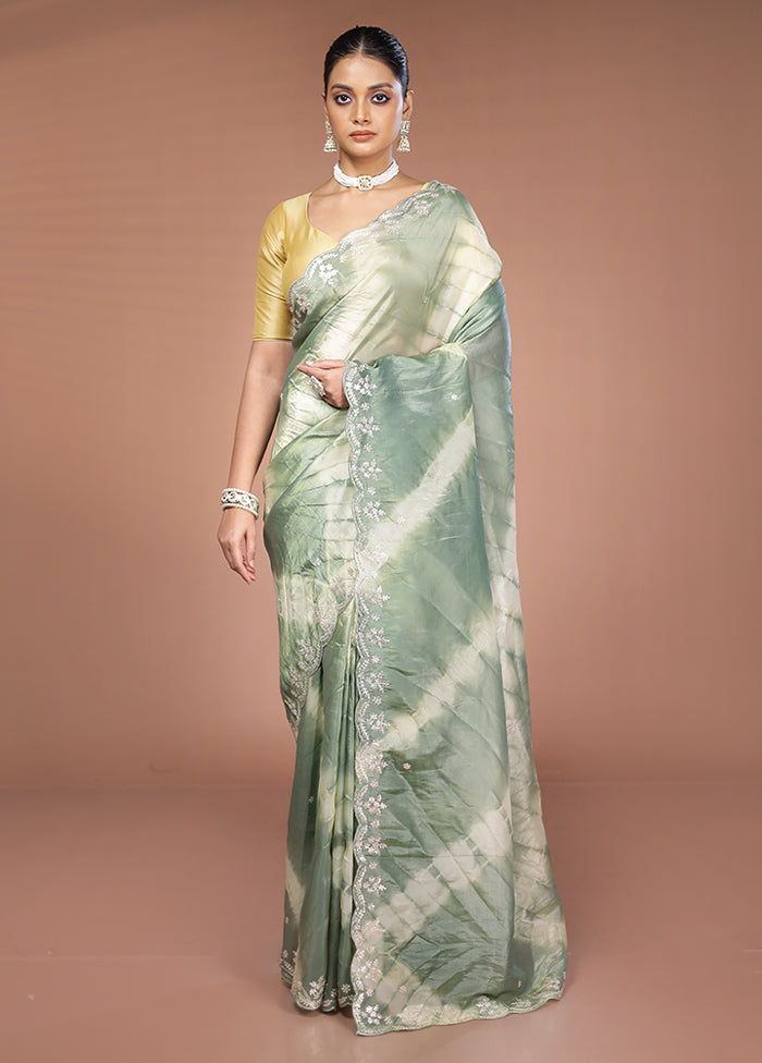 Green Tissue Silk Saree With Blouse Piece