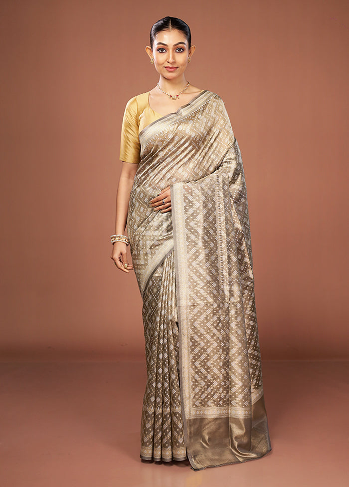 Cream Tissue Silk Saree With Blouse Piece
