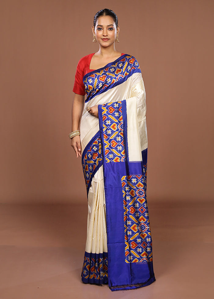 White Handloom Ikkat Pure Silk Saree With Blouse Piece