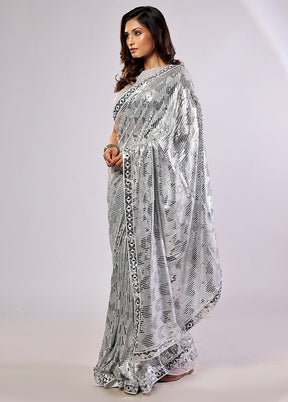 White Handloom Pure Georgette Saree With Blouse Piece