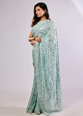 Green Handloom Pure Georgette Saree With Blouse Piece