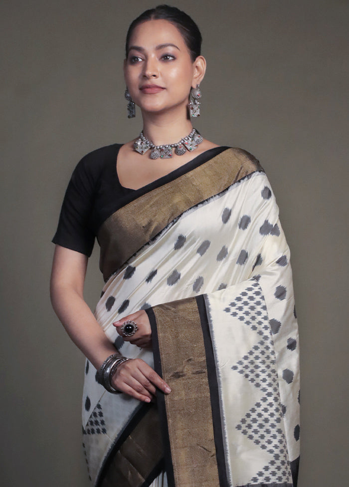 Cream Handloom Ikkat Pure Silk Saree With Blouse Piece