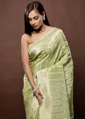 Green Tissue Silk Saree With Blouse Piece