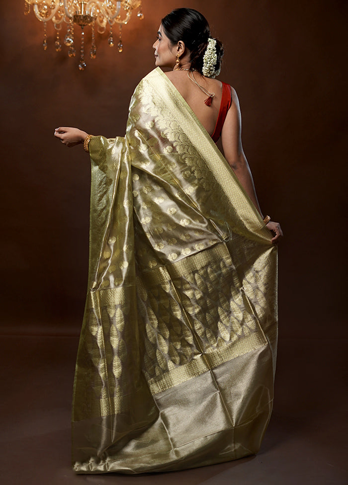 Green Tissue Silk Saree With Blouse Piece