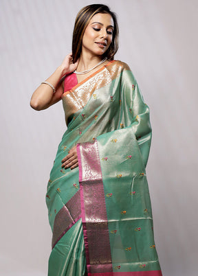 Green Tissue Silk Saree With Blouse Piece