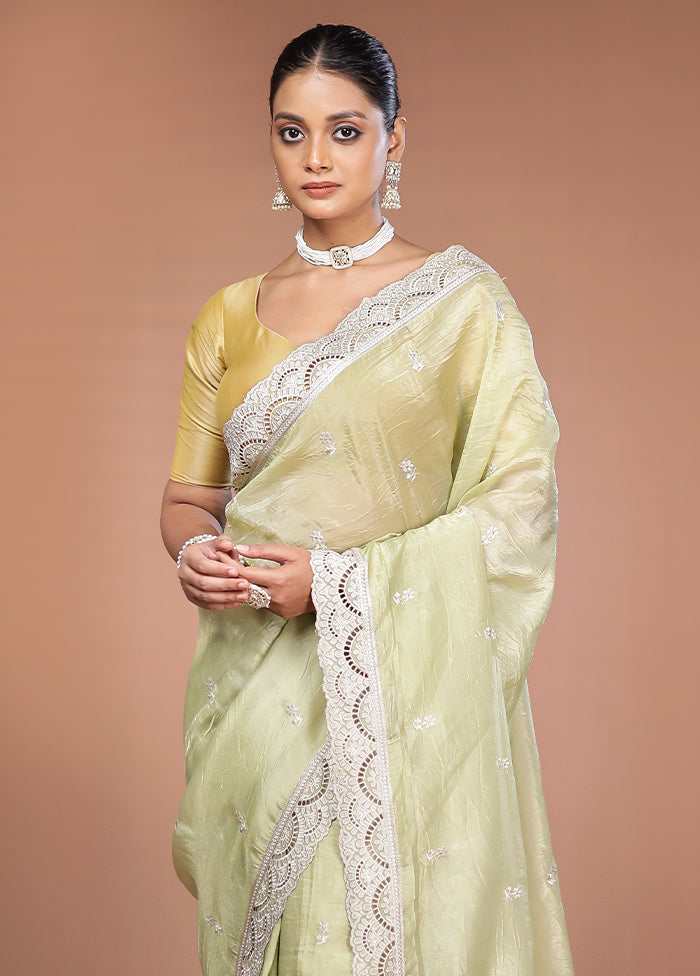 Green Tissue Silk Saree With Blouse Piece