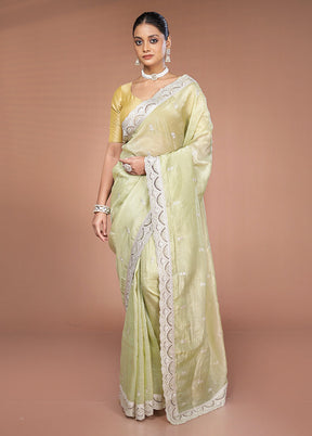 Green Tissue Silk Saree With Blouse Piece