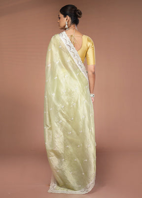 Green Tissue Silk Saree With Blouse Piece