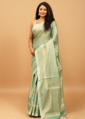 Green Tissue Silk Saree With Blouse Piece