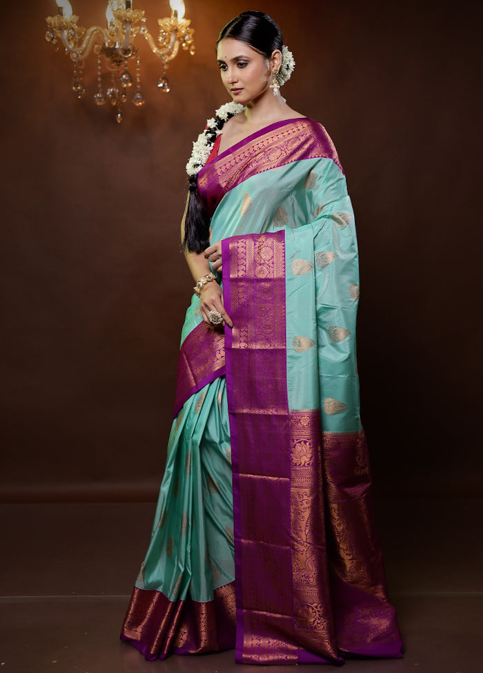 Green Kanjivaram Silk Saree With Blouse Piece