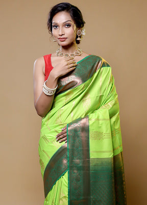 Green Kanjivaram Silk Saree With Blouse Piece