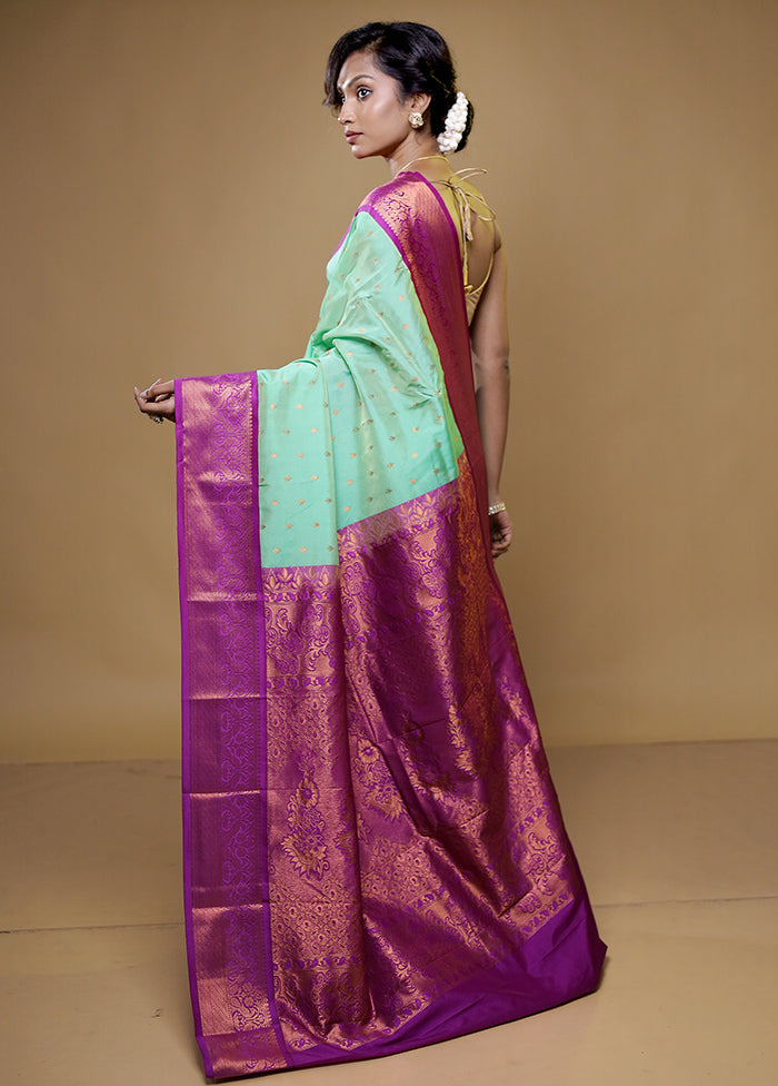 Green Kanjivaram Silk Saree With Blouse Piece