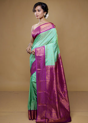 Green Kanjivaram Silk Saree With Blouse Piece