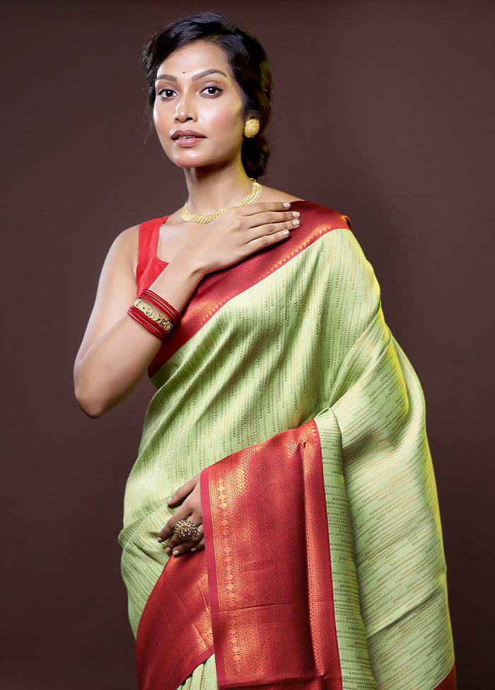 Green Kanjivaram Silk Saree With Blouse Piece