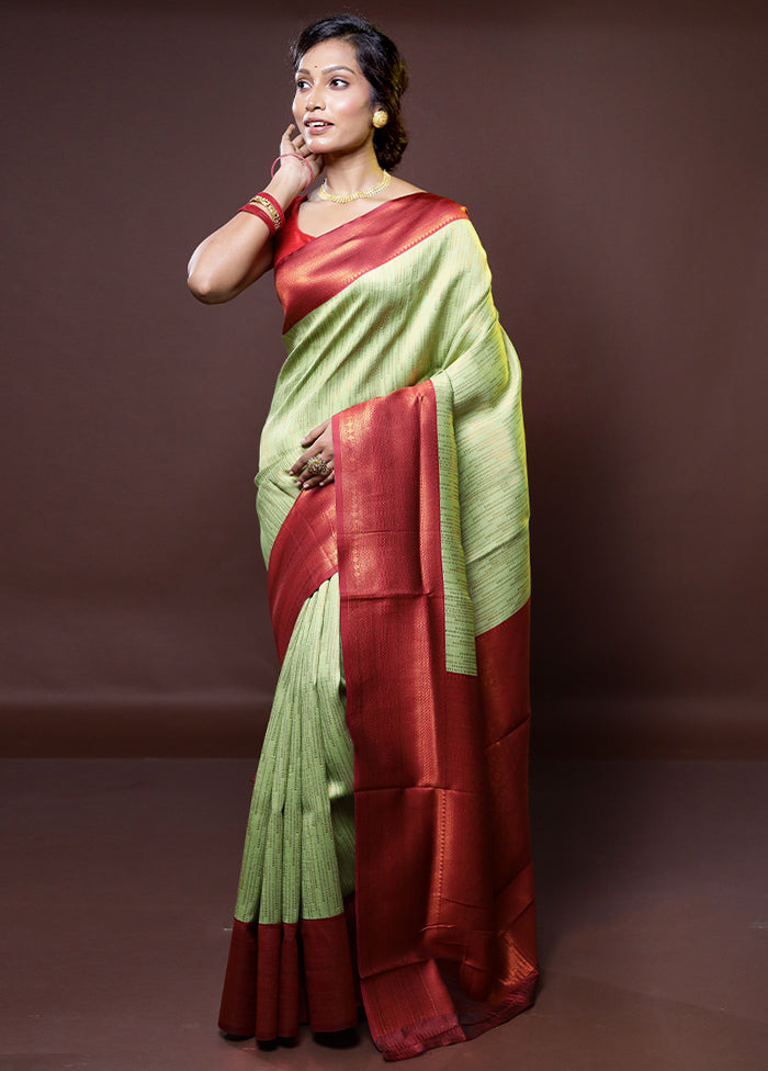 Green Kanjivaram Silk Saree With Blouse Piece