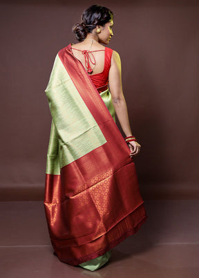 Green Kanjivaram Silk Saree With Blouse Piece