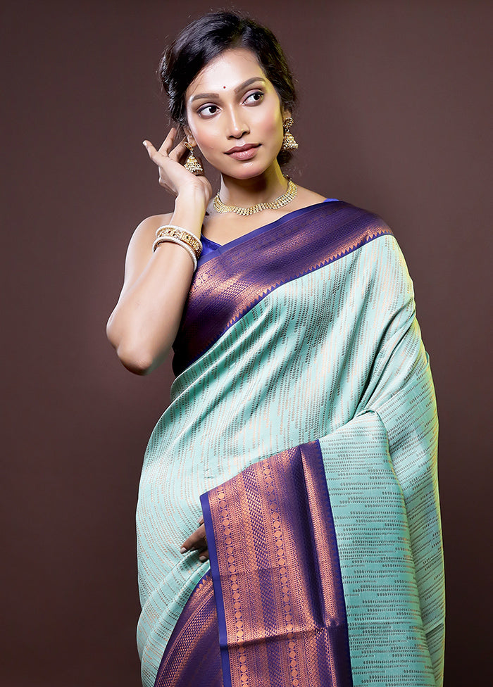 Green Kanjivaram Silk Saree With Blouse Piece