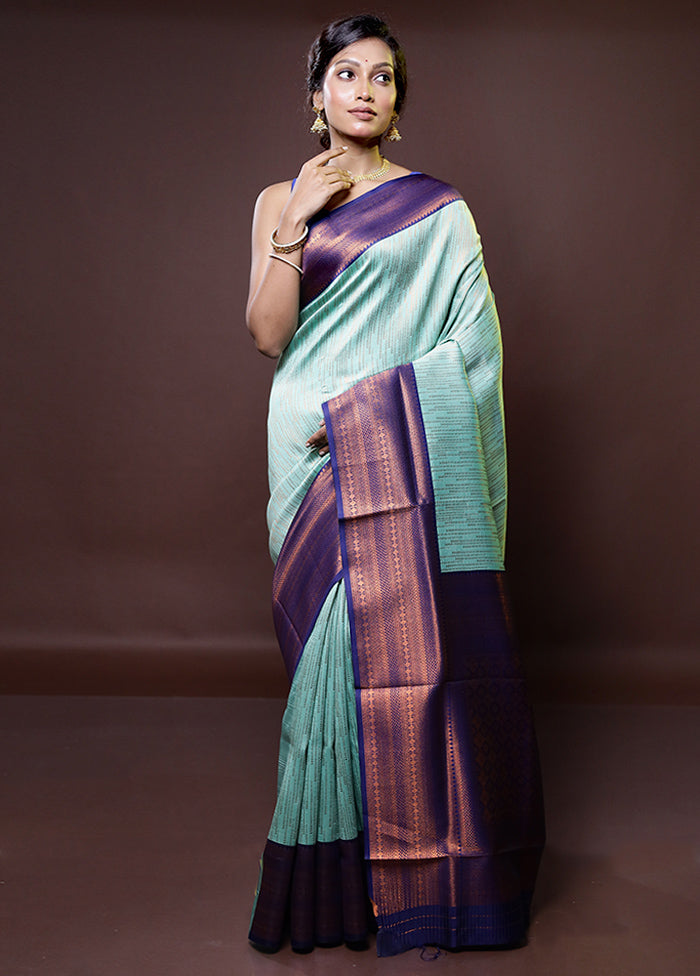 Green Kanjivaram Silk Saree With Blouse Piece