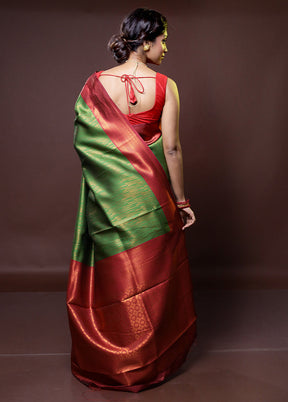 Green Kanjivaram Silk Saree With Blouse Piece