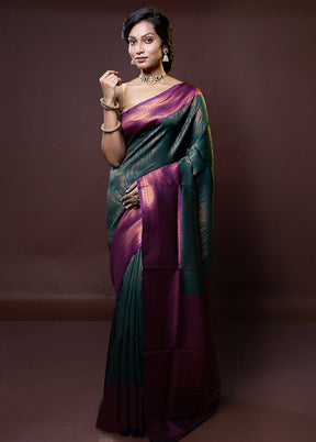 Green Kanjivaram Silk Saree With Blouse Piece