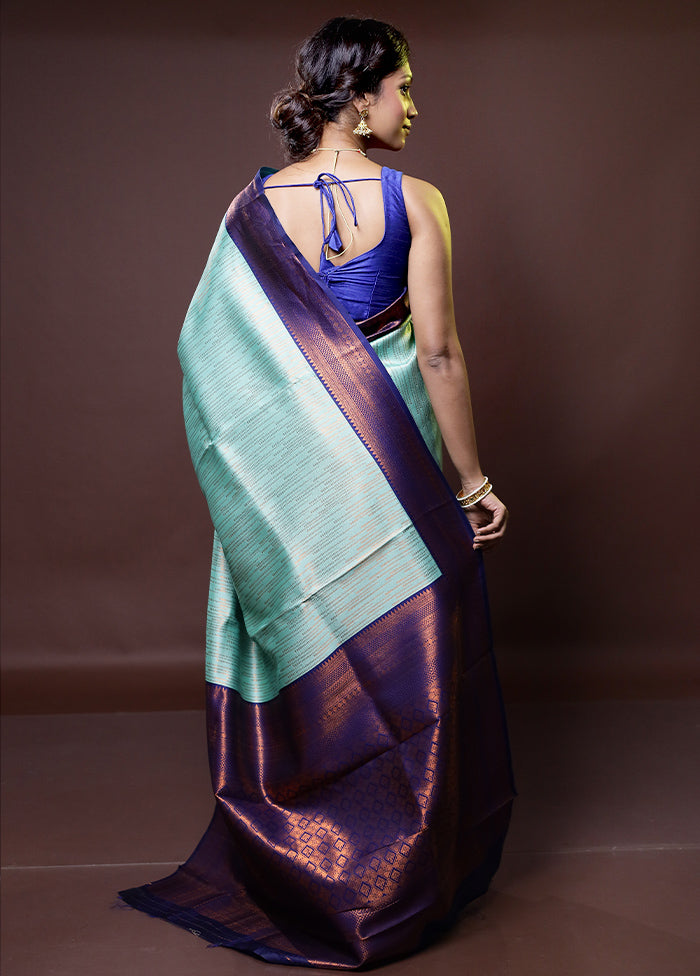 Green Kanjivaram Silk Saree With Blouse Piece