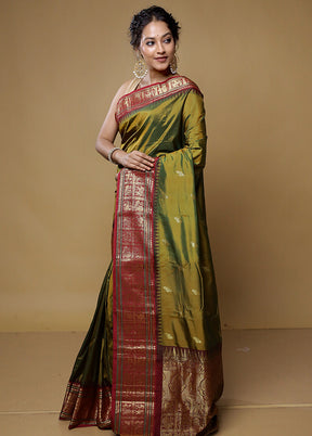 Green Kanjivaram Silk Saree With Blouse Piece