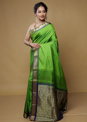 Green Kanjivaram Silk Saree With Blouse Piece