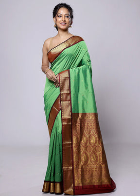 Green Kanjivaram Silk Saree With Blouse Piece