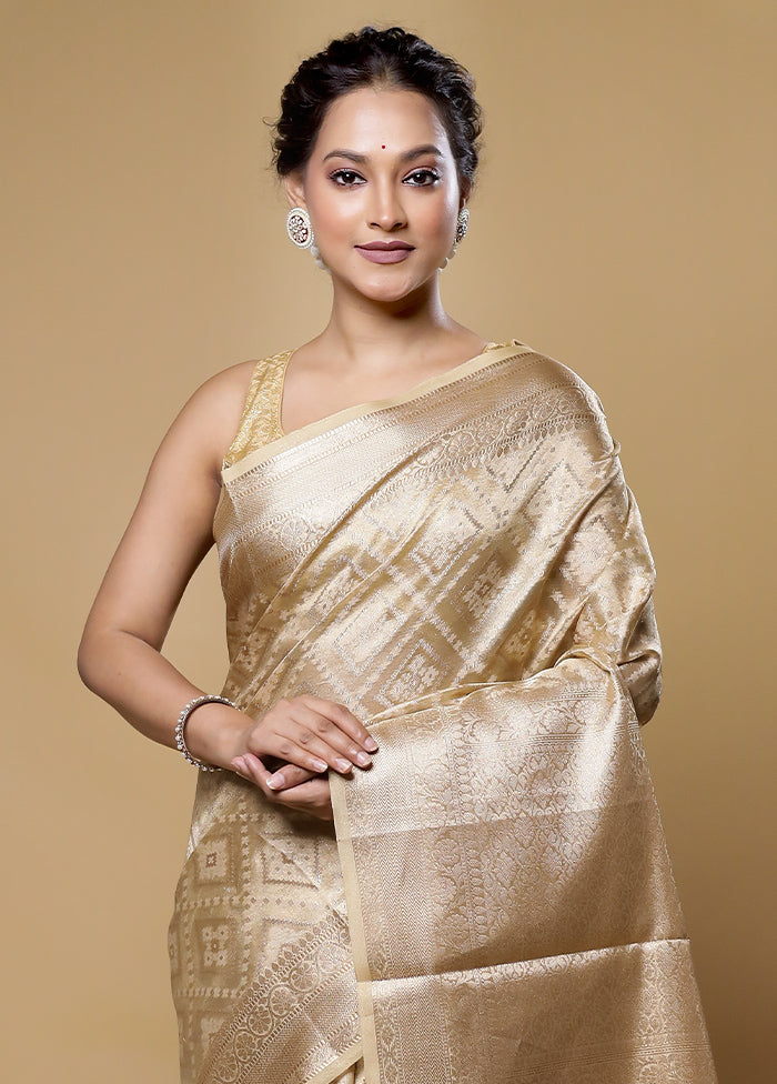 Cream Tissue Silk Saree With Blouse Piece