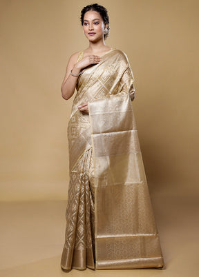 Cream Tissue Silk Saree With Blouse Piece