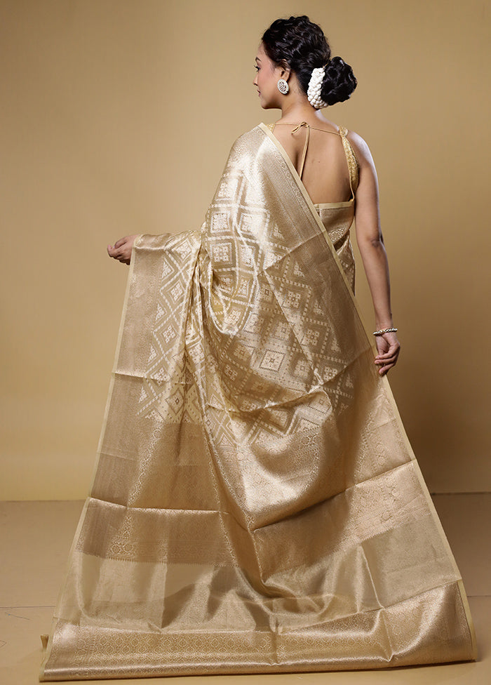 Cream Tissue Silk Saree With Blouse Piece