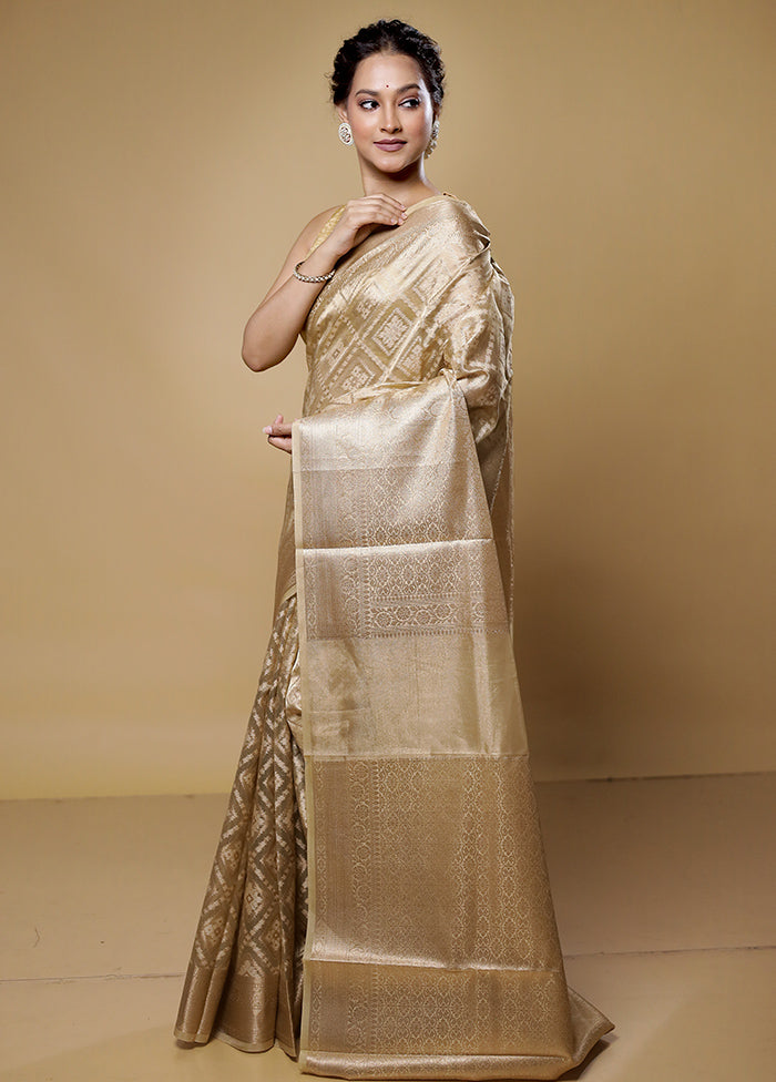 Cream Tissue Silk Saree With Blouse Piece