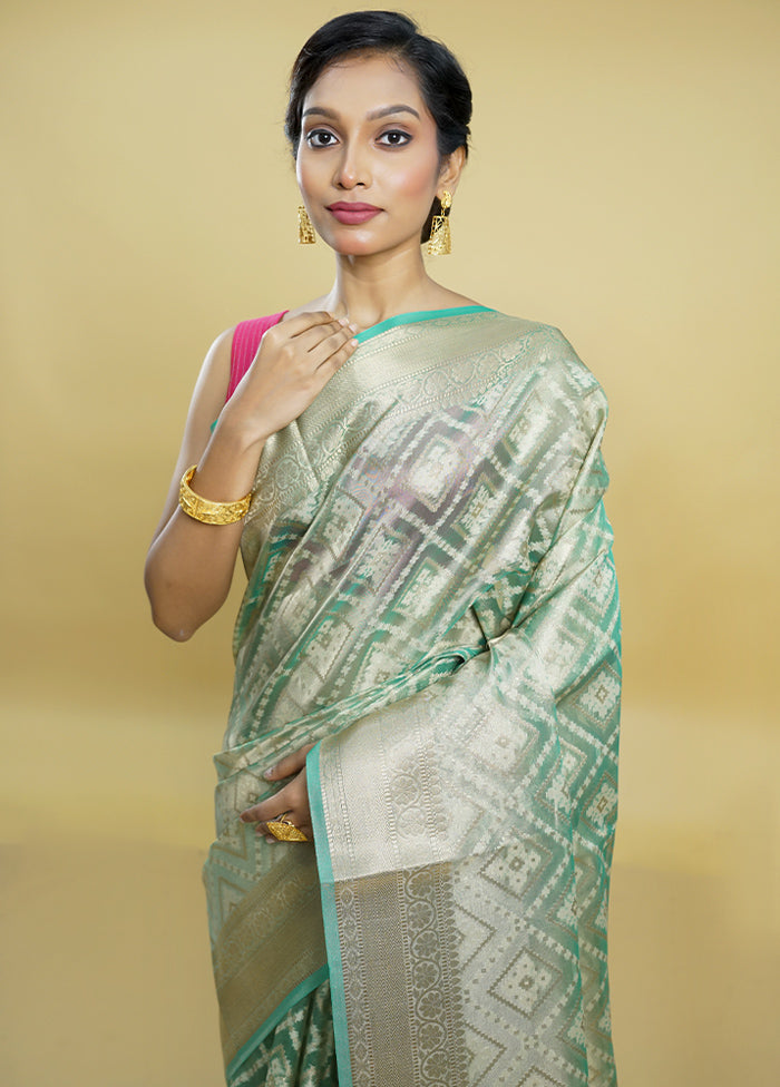 Green Tissue Silk Saree With Blouse Piece