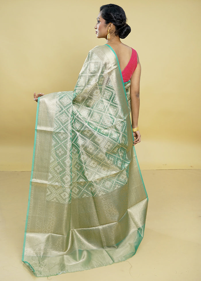 Green Tissue Silk Saree With Blouse Piece