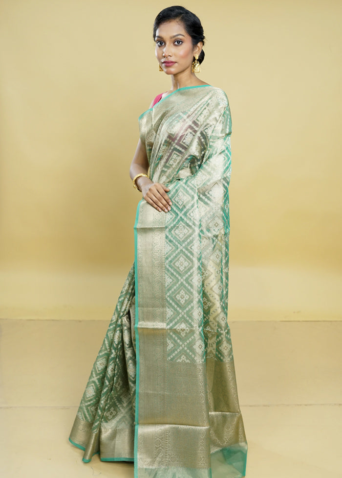 Green Tissue Silk Saree With Blouse Piece