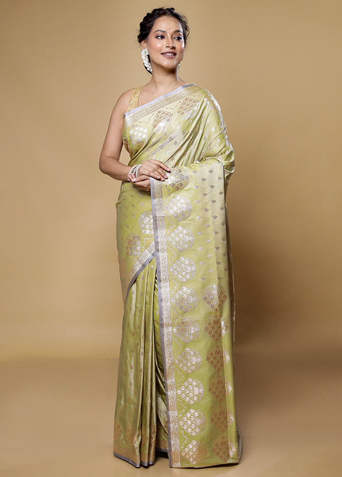 Green Banarasi Silk Saree With Blouse Piece