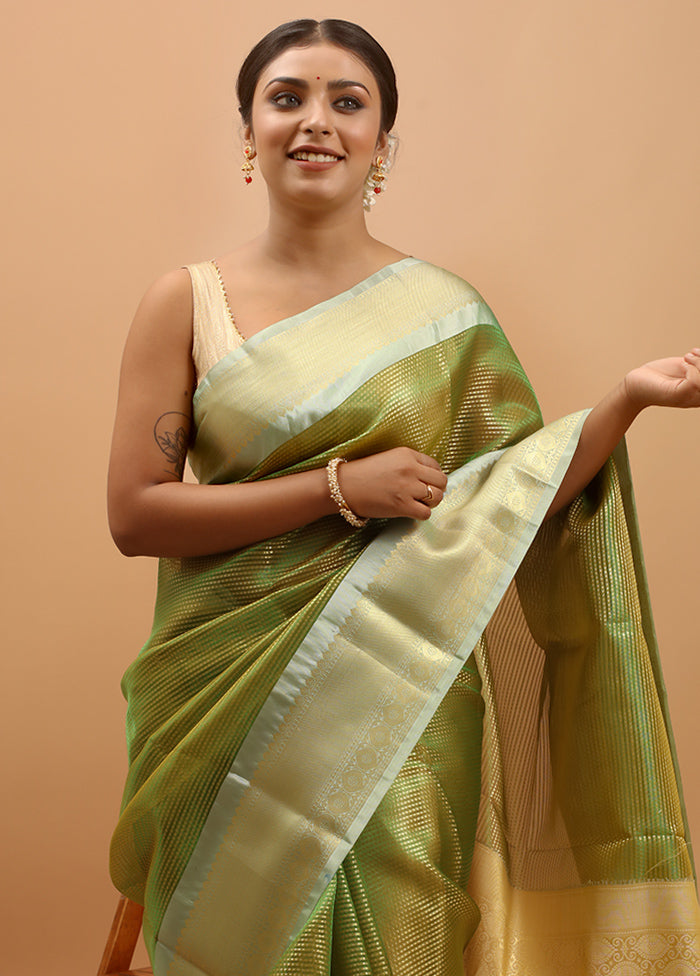 Green Tissue Silk Saree With Blouse Piece