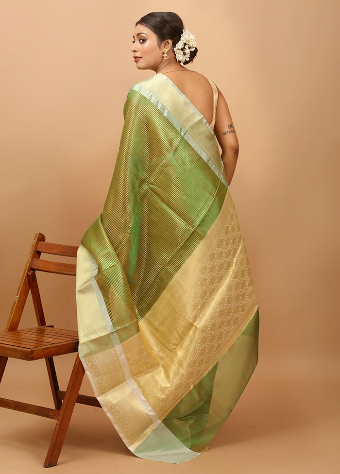 Green Tissue Silk Saree With Blouse Piece