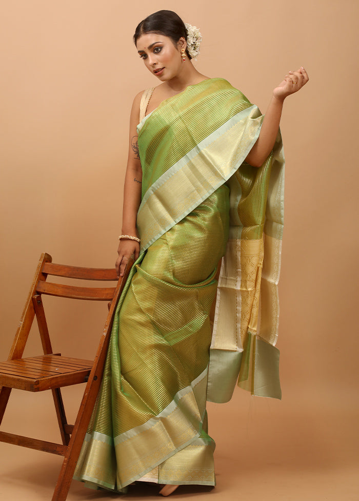 Green Tissue Silk Saree With Blouse Piece