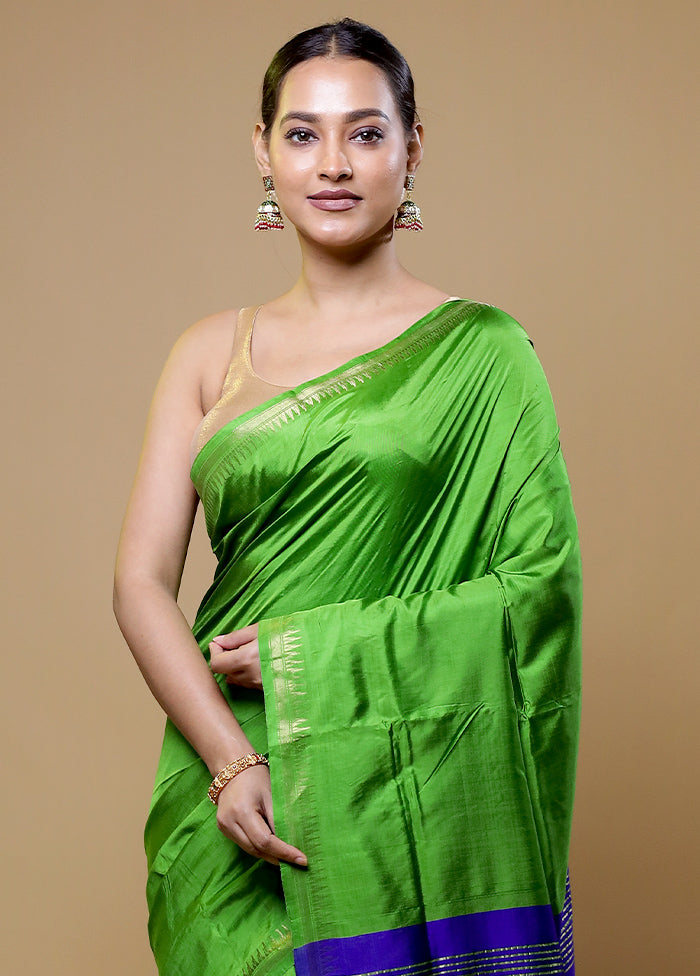 Green Kalakshetra Kanjivaram Silk Saree With Blouse Piece