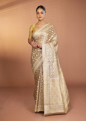 Cream Tissue Silk Saree With Blouse Piece