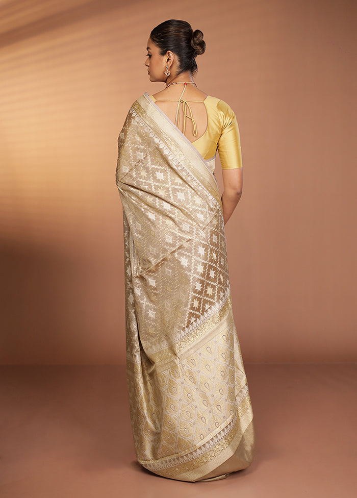 Cream Tissue Silk Saree With Blouse Piece