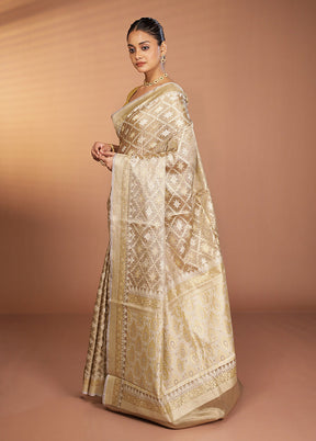 Cream Tissue Silk Saree With Blouse Piece