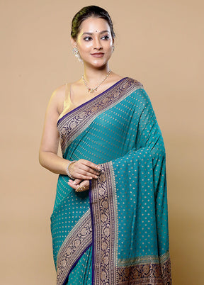 Green Handloom Pure Georgette Saree With Blouse Piece