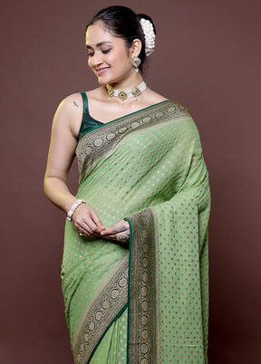 Green Handloom Pure Georgette Saree With Blouse Piece