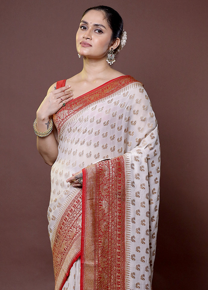 White Handloom Pure Georgette Saree With Blouse Piece