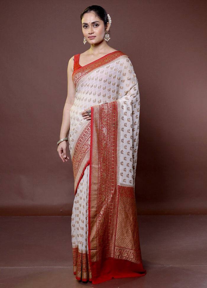 White Handloom Pure Georgette Saree With Blouse Piece