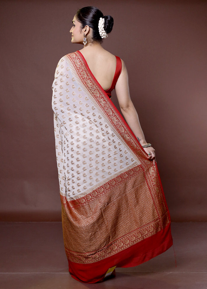 White Handloom Pure Georgette Saree With Blouse Piece