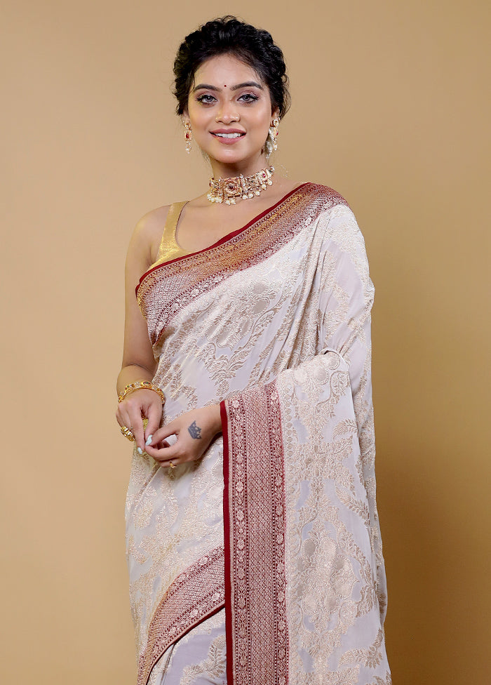 White Handloom Pure Georgette Saree With Blouse Piece