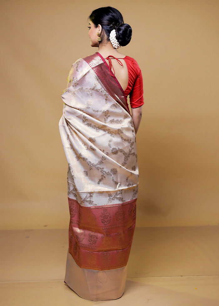 Cream Tissue Silk Saree With Blouse Piece